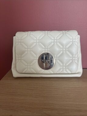 kate spade Quilted Cream Leather Clutch with Turn-Lock